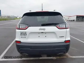 2021 Jeep Cherokee Latitude Lux z VIN 1C4PJMMX4MD221786, wystawiony jako IAAI lot #42432825 z przebiegiem 54 297 mil mil oraz . Historia ofert i sprzedaży dostępna na DreamBid. Obrazek 16.