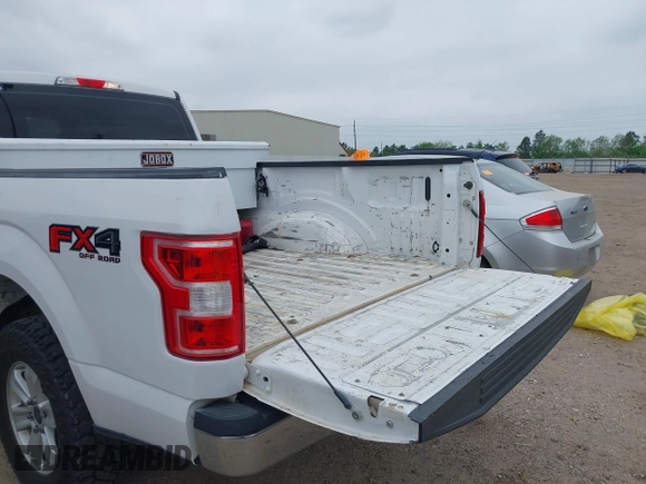 2018 Ford F-150 XL with VIN 1FTFW1E58JKE22834, listed as a IAAI auction lot 41923960 with 214,459 mi miles. Bid and sale history available at carsss.com. Image 18.