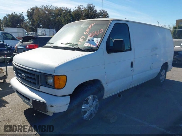 2006 Ford Econoline Cargo with VIN 1FTRE14W46HA46504, listed as a IAAI auction lot 42433510 with 251,238 mi miles and . Bid and sale history available at DreamBid. Image 2.