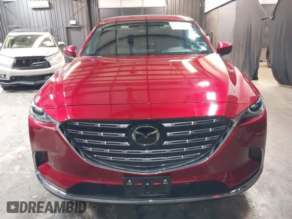 2023 Mazda CX-9 Signature with VIN JM3TCBEY4P0634153, listed as a IAAI auction lot 42132856 with 25,131 mi miles and . Bid and sale history available at DreamBid. Image 6.