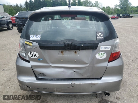 2009 Honda Fit Sport with VIN JHMGE88469S064405, listed as a Copart auction lot 61413745 with 179,497 mi miles and Salvage title. Bid and sale history available at DreamBid. Image 6.