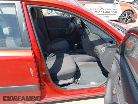 2009 Kia Rio SX with VIN KNADE223396484470, listed as a IAAI auction lot 41964027 with 167,380 mi miles. Bid and sale history available at carsss.com. Image 5.