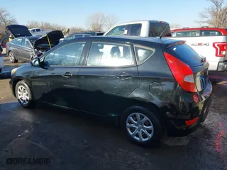 2013 Hyundai Accent GL with VIN KMHCT5AE6DU128989, listed as a IAAI auction lot 41744428 with 92,102 mi miles. Bid and sale history available at carsss.com. Image 14.
