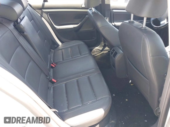 2009 Volkswagen Jetta SE with VIN 3VWRZ71KX9M039028, listed as a IAAI auction lot 42571072 with 112,389 mi miles and . Bid and sale history available at DreamBid. Image 8.
