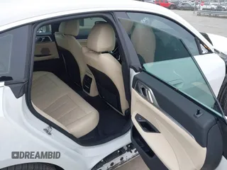 2023 BMW i4 eDrive35 z VIN WBY43AW04PFP70309, wystawiony jako IAAI lot #41745911 z przebiegiem 15 453 mil mil oraz . Historia ofert i sprzedaży dostępna na DreamBid. Obrazek 8.