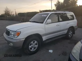 1999 Toyota Land Cruiser z VIN JT3HT0517X0039730, wystawiony jako Copart lot #86423744 z przebiegiem 287 988 mil mil oraz Czysty tytuł • Clean title. Historia ofert i sprzedaży dostępna na DreamBid. Obrazek 1.