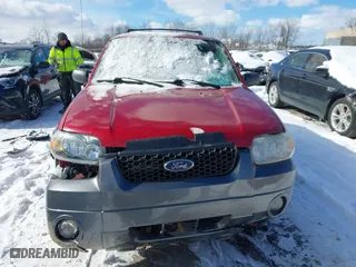 2005 Ford Escape XLT with VIN 1FMYU931X5KD99667, listed as a IAAI auction lot 41591057 with 69,595 mi miles. Bid and sale history available at carsss.com. Image 12.
