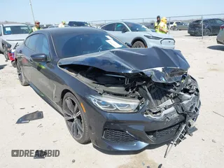 2022 BMW 8 Series 840i with VIN WBAGV2C00NCJ11173, listed as a IAAI auction lot 41829086 with 28,906 mi miles and . Bid and sale history available at DreamBid. Image 1.