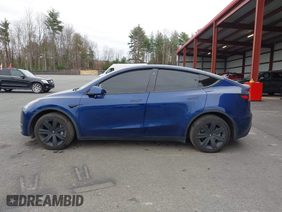 2021 Tesla Model Y Long Range with VIN 5YJYGDEE9MF071120, listed as a IAAI auction lot 40870088 with 73,438 mi miles and . Bid and sale history available at carsss.com. Image 15.