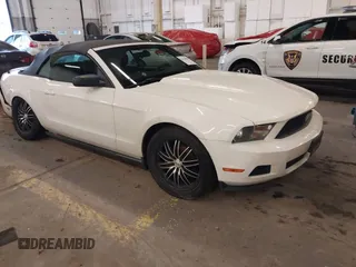 2010 Ford Mustang V6 with VIN 1ZVBP8EN5A5122930, listed as a IAAI auction lot 41128804 with 116,447 mi miles. Bid and sale history available at carsss.com. Image 1.