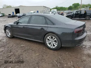 2017 Audi A8 z VIN WAU44AFD0HN004258, wystawiony jako Copart lot #55283985 z przebiegiem 128 059 mil mil oraz Szkoda całkowita • Salvage title. Historia ofert i sprzedaży dostępna na DreamBid. Obrazek 2.