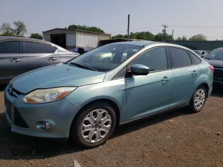 2012 Ford Focus SE with VIN 1FAHP3F2XCL285615, listed as a Copart auction lot 61990865 with 154,161 mi miles and Salvage title. Bid and sale history available at DreamBid. Image 1.