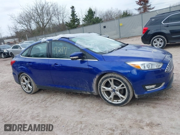 2015 Ford Focus Titanium with VIN 1FADP3J27FL298882, listed as a IAAI auction lot 42117247 with 124,185 mi miles and . Bid and sale history available at carsss.com. Image 13.