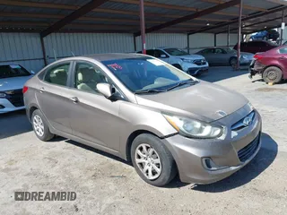 2014 Hyundai Accent GLS z VIN KMHCT4AE9EU671748, wystawiony jako IAAI lot #42356469 z przebiegiem 179 390 mil mil oraz . Historia ofert i sprzedaży dostępna na DreamBid. Obrazek 1.