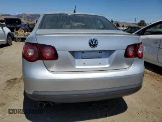 2009 Volkswagen Jetta S with VIN 3VWJZ71K39M149271, listed as a Copart auction lot 64703065 with 214,011 mi miles and Clean title. Bid and sale history available at DreamBid. Image 6.