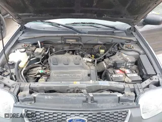 2003 Ford Escape XLT Popular 2 with VIN 1FMYU93103KA39840, listed as a IAAI auction lot 41966605 with 141,321 mi miles. Bid and sale history available at carsss.com. Image 10.