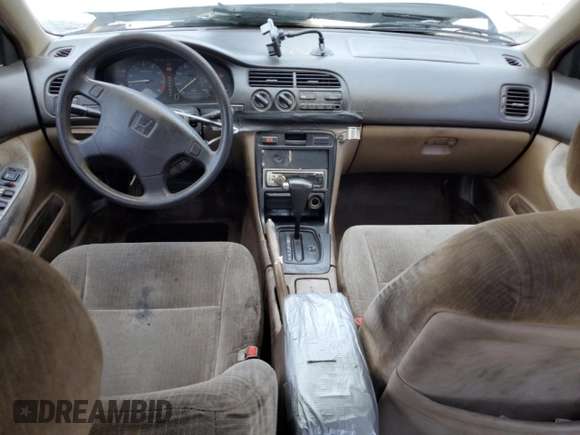 1994 Honda Accord с VIN 1HGCD5642RA166652, выставлен на аукционе Copart как лот 57225365 с пробегом 247 643 миль миль и Списание • Salvage title. История ставок и продаж доступна на DreamBid. Изображение 8.
