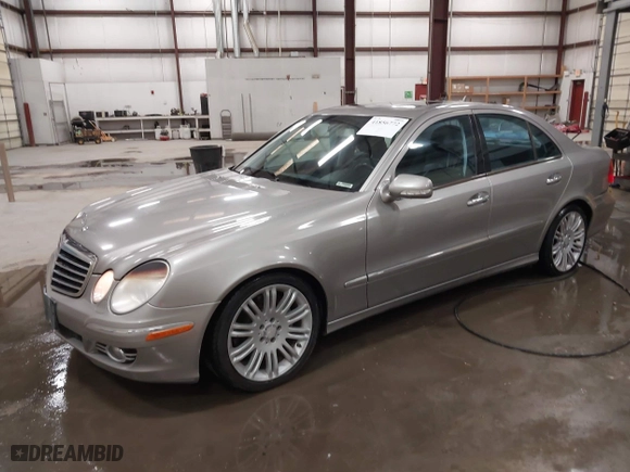 2007 Mercedes-Benz E-Class 3.5L with VIN WDBUF56X07B130147, listed as a IAAI auction lot 41856772 with 174,569 mi miles. Bid and sale history available at carsss.com. Image 18.