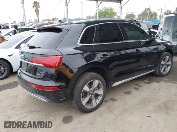 2023 Audi Q5 Premium Plus z VIN WA1BBAFY7P2187588, wystawiony jako IAAI lot #42052046 z przebiegiem 18 987 mil mil oraz . Historia ofert i sprzedaży dostępna na DreamBid. Obrazek 4.