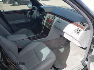 1998 Mercedes-Benz E-Class with VIN WDBJF65F0WA476690, listed as a IAAI auction lot 40646024 with 199,593 mi miles. Bid and sale history available at carsss.com. Image 5.