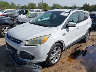 2013 Ford Escape SE with VIN 1FMCU0GX2DUB60296, listed as a IAAI auction lot 41955131 with 144,762 mi miles. Bid and sale history available at carsss.com. Image 2.