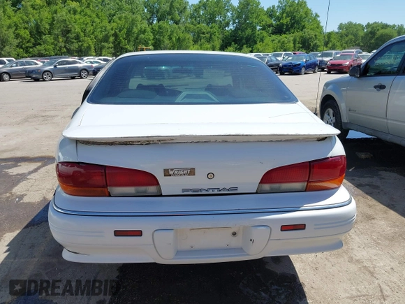 1993 Pontiac Bonneville SE z VIN 1G2HX53L8P1281104, wystawiony jako IAAI lot #42219547 z przebiegiem 113 292 mil mil oraz . Historia ofert i sprzedaży dostępna na DreamBid. Obrazek 16.
