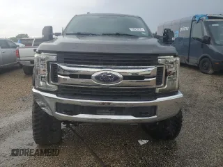2018 Ford F-250 XL with VIN 1FT7W2B65JEB83300, listed as a Copart auction lot 55920255 with 104,125 mi miles and Salvage title. Bid and sale history available at DreamBid. Image 5.
