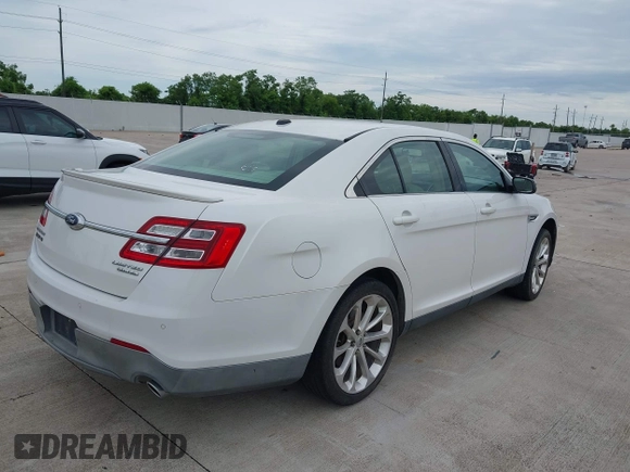2013 Ford Taurus Limited with VIN 1FAHP2F8XDG127848, listed as a IAAI auction lot 42498773 with 103,299 mi miles and . Bid and sale history available at DreamBid. Image 4.