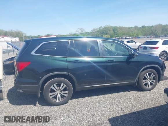 2017 Honda Pilot EX-L z VIN 5FNYF6H51HB091555, wystawiony jako IAAI lot #42141088 z przebiegiem 127 327 mil mil oraz . Historia ofert i sprzedaży dostępna na DreamBid. Obrazek 13.