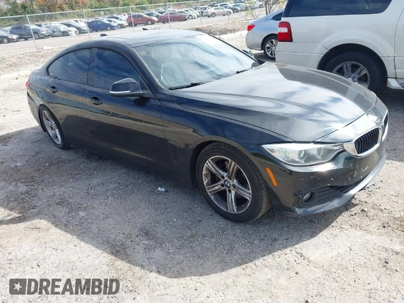 2015 BMW 4 Series 428i z VIN WBA4A9C58FGL85170, wystawiony jako IAAI lot #41362595 z przebiegiem 172 509 mil mil oraz . Historia ofert i sprzedaży dostępna na DreamBid. Obrazek 1.