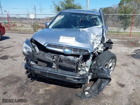 2017 Subaru Forester Touring with VIN JF2SJAWC7HH523883, listed as a IAAI auction lot 41595014 with 74,654 mi miles. Bid and sale history available at carsss.com. Image 6.