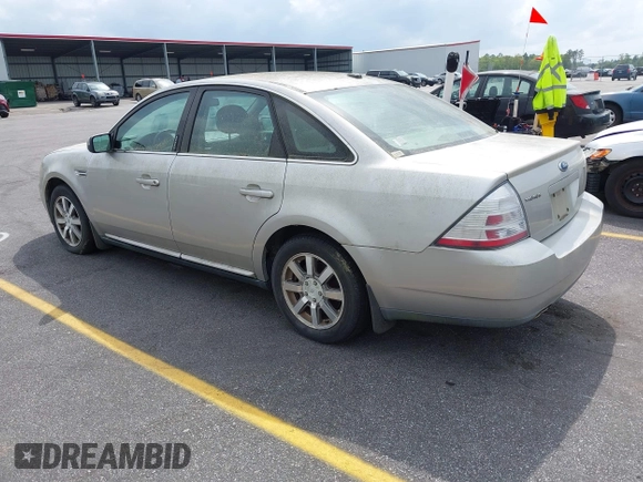 2008 Ford Taurus SEL with VIN 1FAHP24W88G178210, listed as a IAAI auction lot 41933552 with 142,971 mi miles. Bid and sale history available at carsss.com. Image 3.