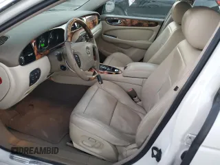 2004 Jaguar XJ with VIN SAJWA71C14SG16264, listed as a Copart auction lot 83251554 with 267,493 mi miles and Salvage Title. Bid and sale history available at carsss.com. Image 7.