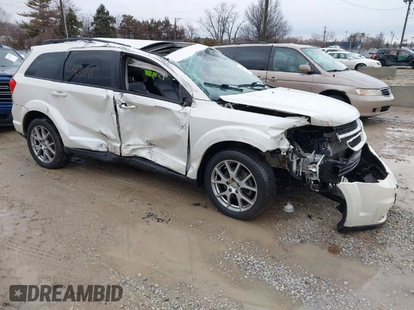 2013 Dodge Journey R/T with VIN 3C4PDDEG0DT651153, listed as a IAAI auction lot 41724885 with 133,391 mi miles and . Bid and sale history available at DreamBid. Image 1.