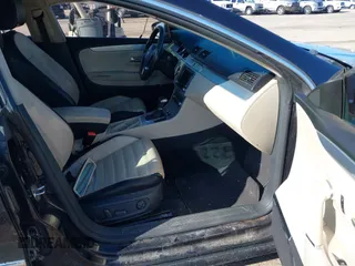 2009 Volkswagen CC 4Motion with VIN WVWGU73C19E515087, listed as a IAAI auction lot 41862228 with 194,115 mi miles. Bid and sale history available at carsss.com. Image 5.