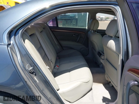 2005 Acura RL z VIN JH4KB16505C012679, wystawiony jako IAAI lot #41976411 z przebiegiem 103 342 mil mil oraz . Historia ofert i sprzedaży dostępna na DreamBid. Obrazek 8.