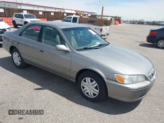 2000 Toyota Camry CE z VIN 4T1BG22K6YU682705, wystawiony jako IAAI lot #42080842 z przebiegiem 376 532 mil mil oraz . Historia ofert i sprzedaży dostępna na DreamBid. Obrazek 1.