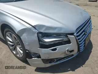 2011 Audi A8 with VIN WAURVAFD4BN019033, listed as a IAAI auction lot 42532173 with 97,486 mi miles and . Bid and sale history available at DreamBid. Image 6.