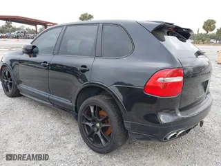2009 Porsche Cayenne GTS with VIN WP1AD29P99LA62818, listed as a IAAI auction lot 41627073 with 166,414 mi miles. Bid and sale history available at carsss.com. Image 3.