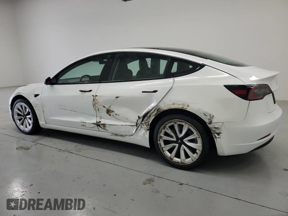 2023 Tesla Model 3 with VIN 5YJ3E1EA7PF428472, listed as a Copart auction lot 56520465 with 79,936 mi miles and Clean title. Bid and sale history available at DreamBid. Image 2.