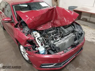 2016 Volkswagen Passat 1.8T S with VIN 1VWAS7A39GC013979, listed as a IAAI auction lot 41533003 with 162,746 mi miles. Bid and sale history available at carsss.com. Image 6.