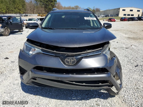 2016 Toyota RAV4 LE with VIN JTMZFREV9GJ069675, listed as a Copart auction lot 47943105 with 202,708 mi miles and Salvage Title. Bid and sale history available at carsss.com. Image 5.