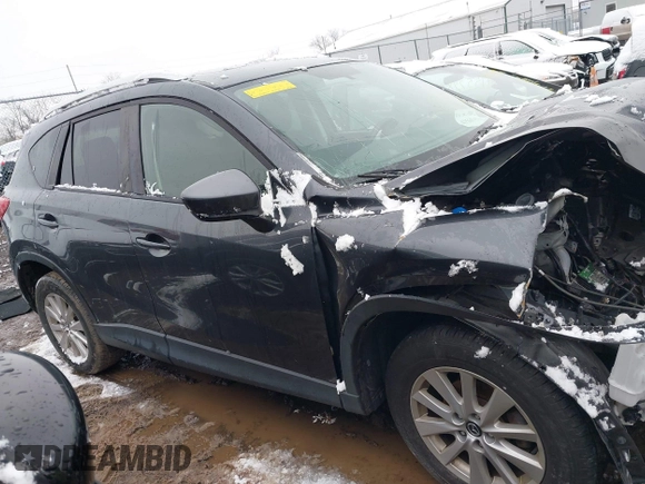 2014 Mazda CX-5 Touring with VIN JM3KE2CY2E0407453, listed as a IAAI auction lot 41564916 with 104,852 mi miles. Bid and sale history available at carsss.com. Image 12.
