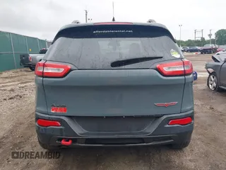 2014 Jeep Cherokee Trailhawk with VIN 1C4PJMBB5EW156315, listed as a IAAI auction lot 42426229 with 154,019 mi miles and . Bid and sale history available at DreamBid. Image 17.