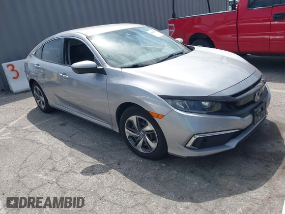2019 Honda Civic Sedan LX with VIN 2HGFC2F61KH536965, listed as a IAAI auction lot 42030634 with 1 mi miles. Bid and sale history available at carsss.com. Image 1.