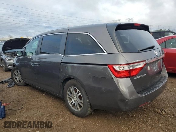 2011 Honda Odyssey EX-L with VIN 5FNRL5H65BB029311, listed as a Copart auction lot 81916724 with 184,034 mi miles and Salvage Title. Bid and sale history available at DreamBid. Image 2.