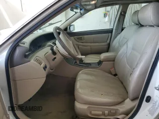 2000 Toyota Avalon XL with VIN 4T1BF28B9YU112742, listed as a Copart auction lot 54719355 with 213,896 mi miles and Salvage Title. Bid and sale history available at DreamBid. Image 7.