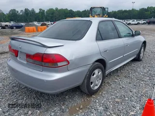 2002 Honda Accord EX z VIN 1HGCG16562A084499, wystawiony jako IAAI lot #42446830 z przebiegiem 241 615 mil mil oraz . Historia ofert i sprzedaży dostępna na DreamBid. Obrazek 4.