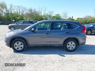 2015 Honda CR-V LX with VIN 2HKRM3H31FH557779, listed as a IAAI auction lot 42098299 with 211,683 mi miles and . Bid and sale history available at carsss.com. Image 14.