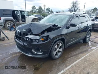 2020 Jeep Cherokee Limited with VIN 1C4PJLDB0LD560770, listed as a IAAI auction lot 41721370 with 116,245 mi miles. Bid and sale history available at carsss.com. Image 2.
